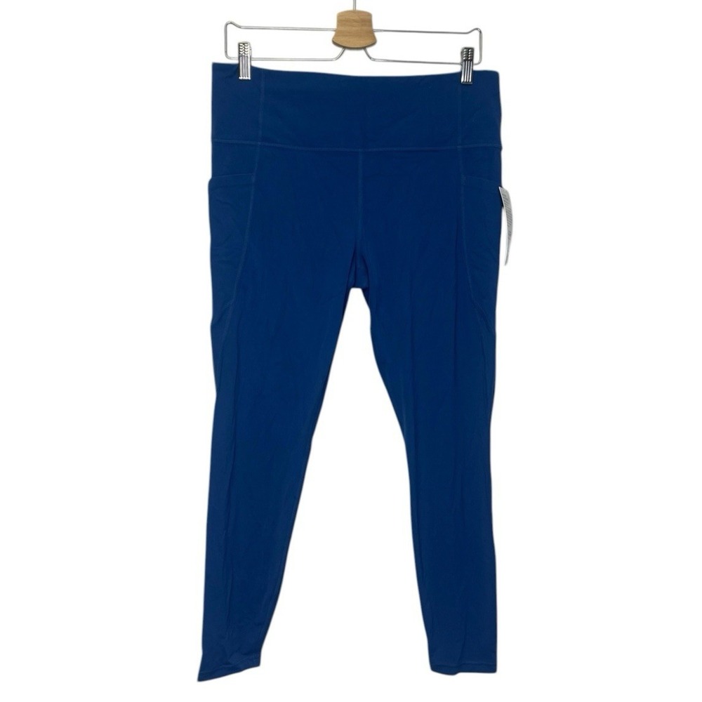 NWT ATHLETA Women Stash Pocket Salutation Tights XL Blue Athleisure UPF 50 +